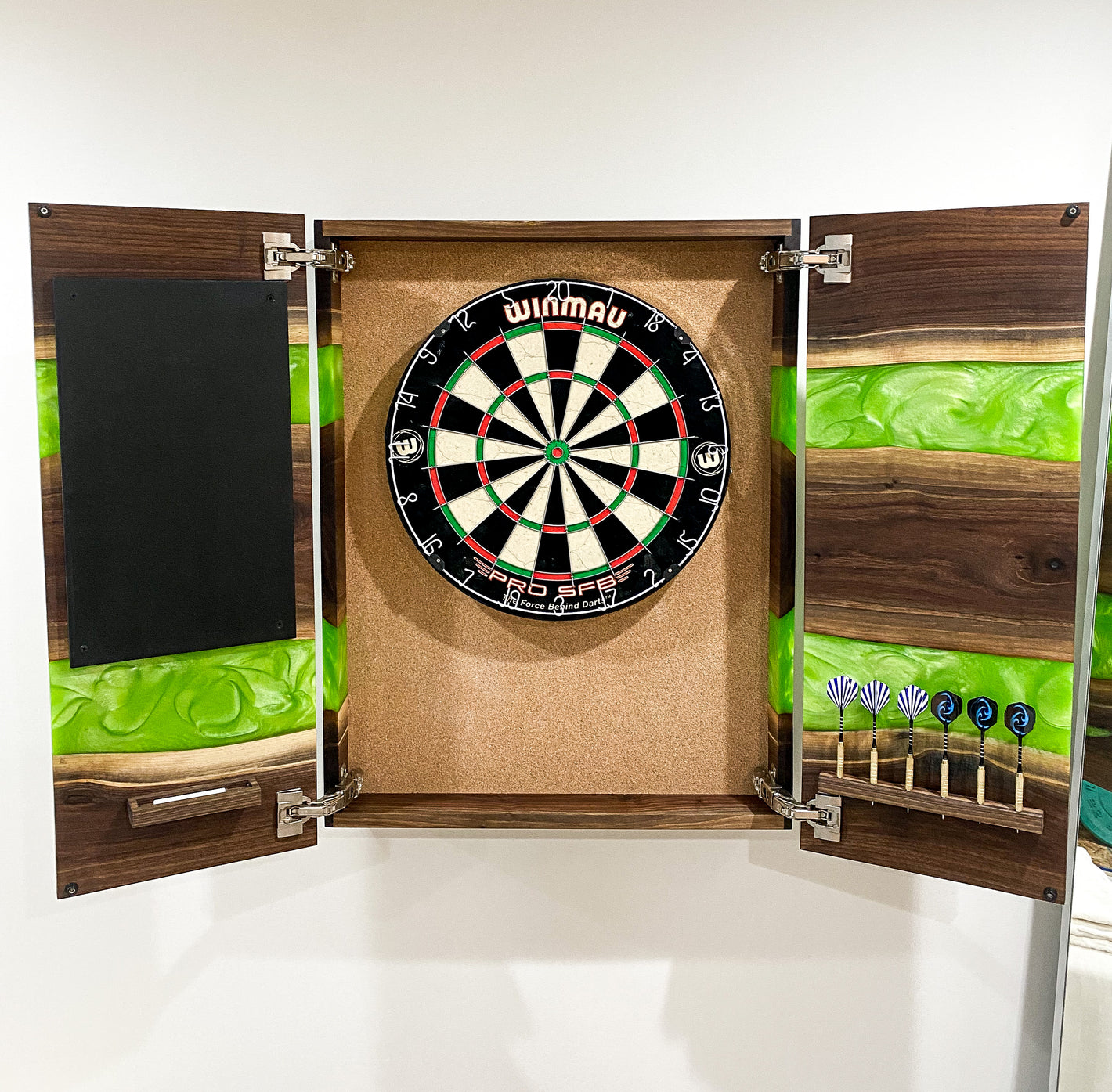 Distinctive hardwood dart board cabinet with green resin inlay